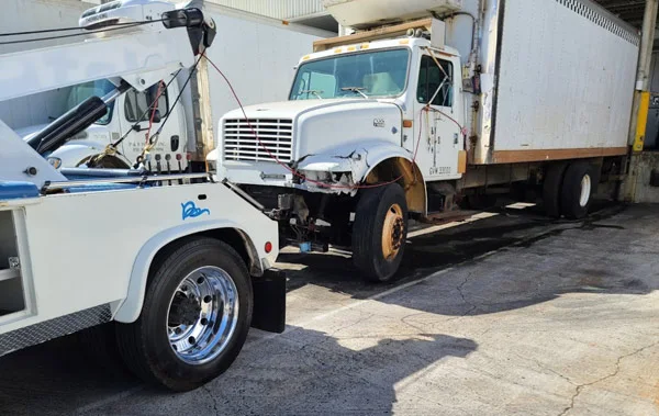 Flatbed Towing a truck in Waco